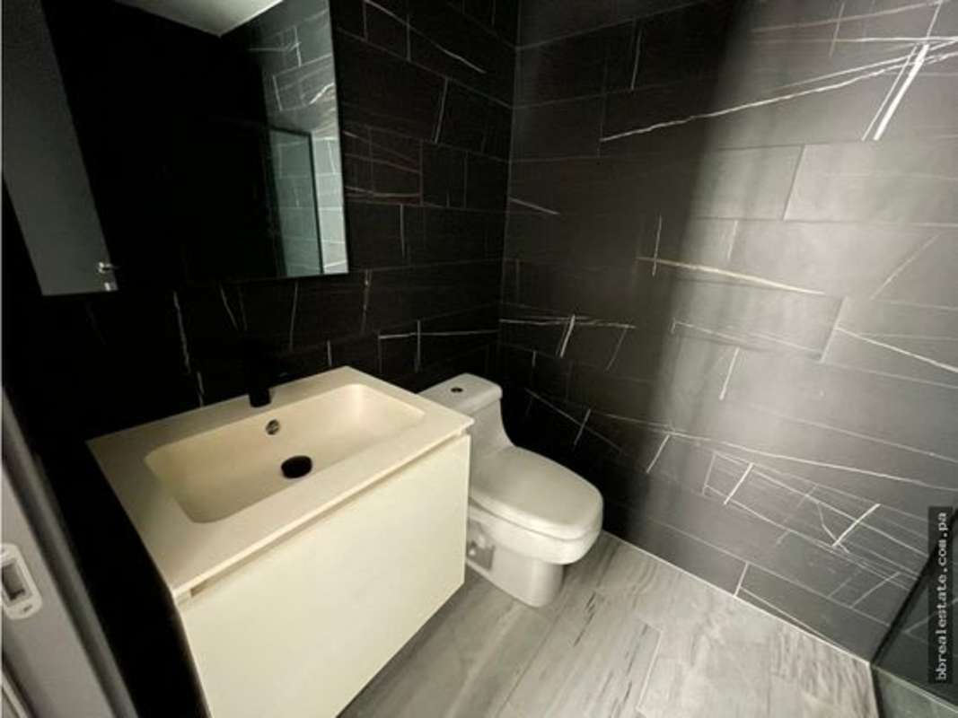 Modern bathroom with marble tiling, walk-in shower in PH Nuovo by Armani Bella Vista Panama City