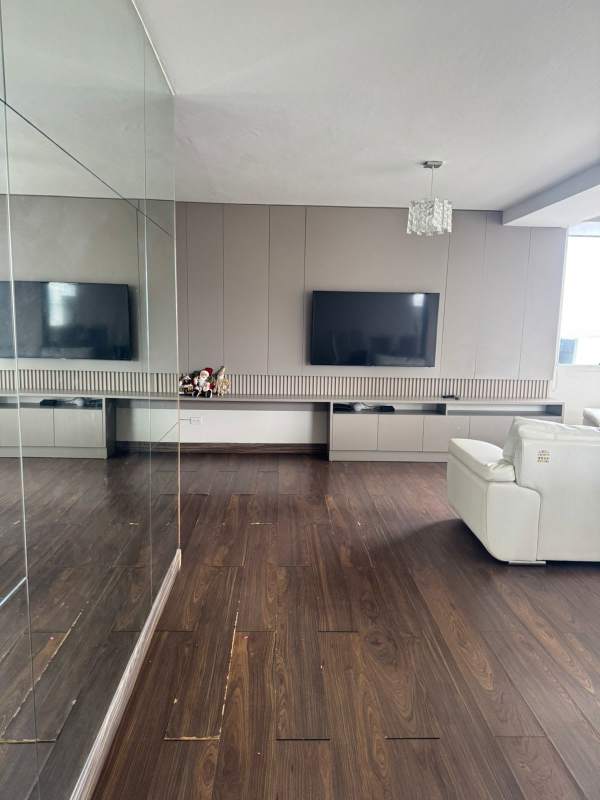 Dining room with large windows and cityscape view PH Paitilla Tower Panama