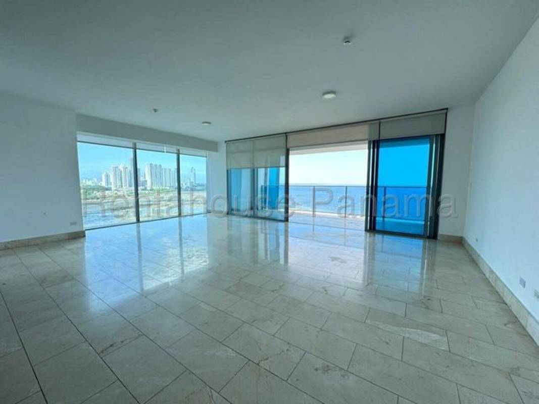 Modern kitchen with granite counters, stainless appliances, oceanview window in PH Pacific Point, Panama