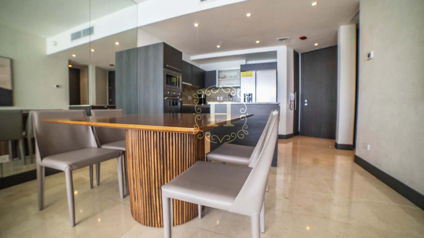 Modern kitchen with granite countertops and built-in appliances at JW Marriott Panama