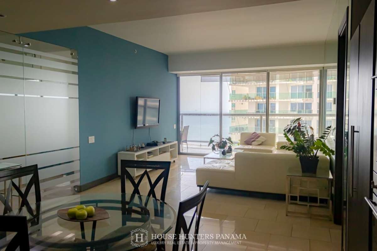 Renovated kitchen with granite countertops and stainless steel appliances in The Ocean Club Panama City