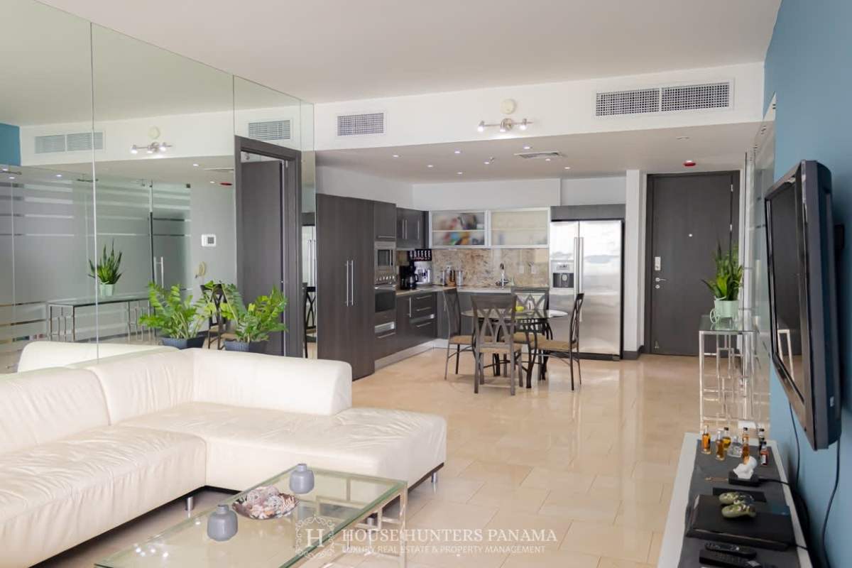 Bathroom with floor-to-ceiling blue marble, glass shower, Hansgrohe fixtures in The Ocean Club Panama