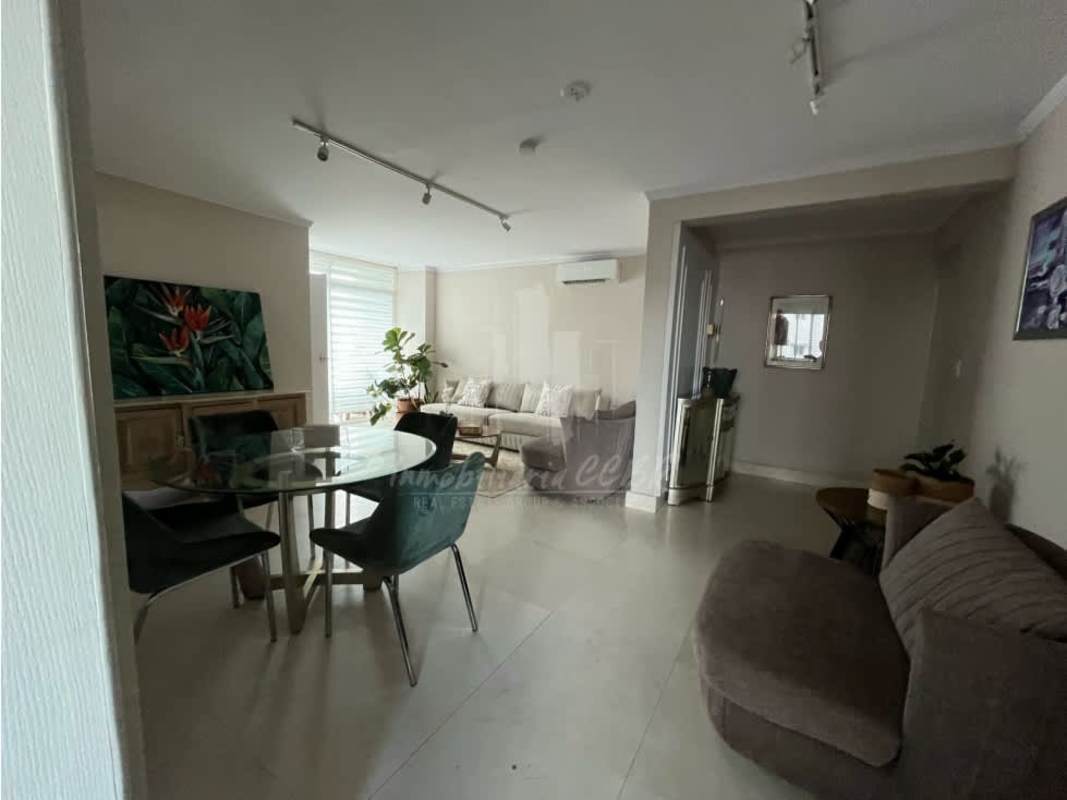 Contemporary living dining room with glass table, AC, wall art PH Dalí Panama