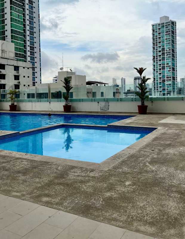 Spacious balcony with glass railing offering city skyline view in PH Titanium San Francisco Panama