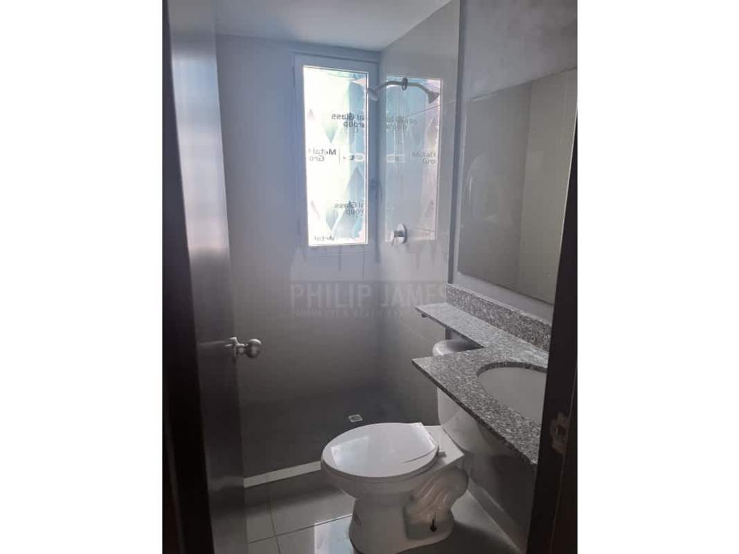 Walk-in closet with built-in shelving at PH Delavista Panama City for sale