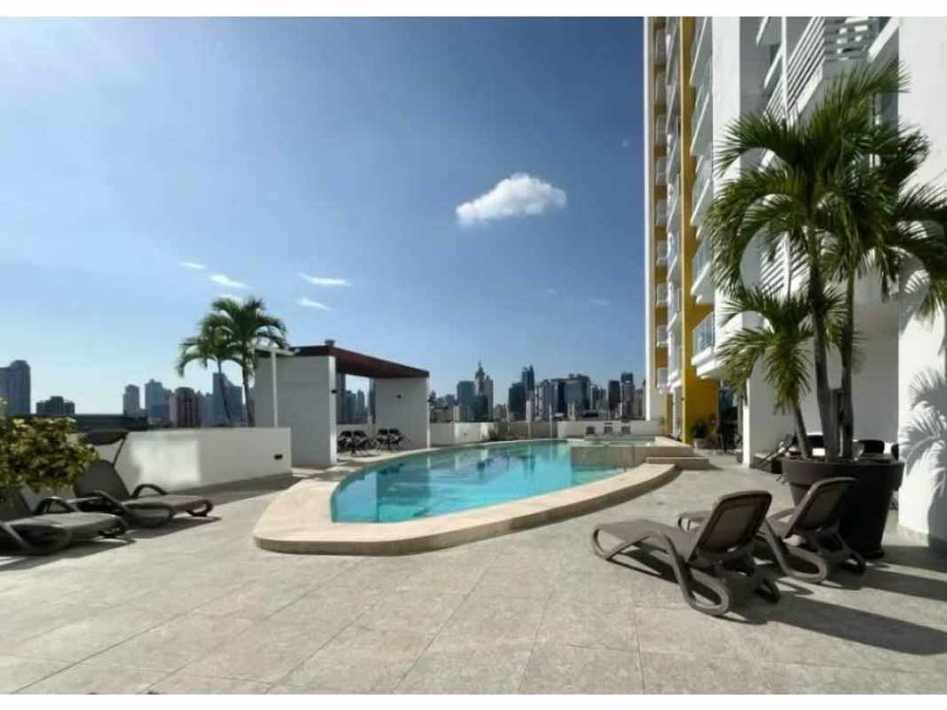 Lounge with bean bags, accent chairs and decor in PH Metropolitan Park Panama City