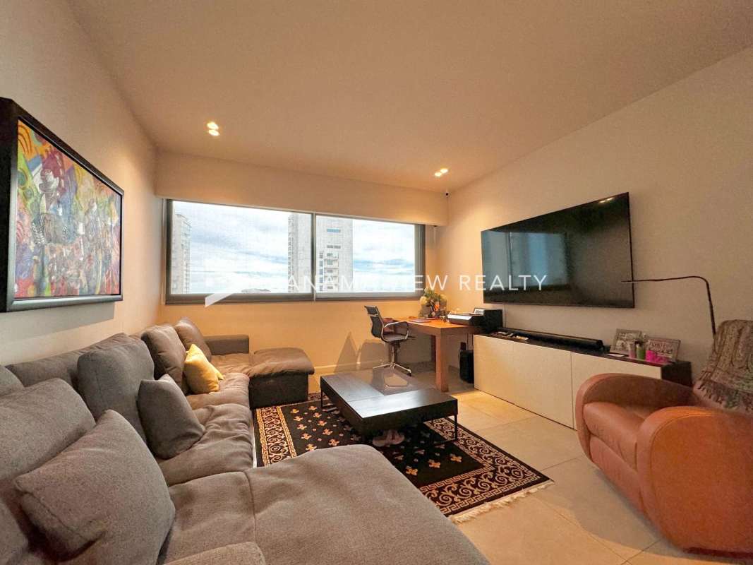 Modern spacious living room with panoramic windows overlooking Pacific Ocean PH Aqualina Panama