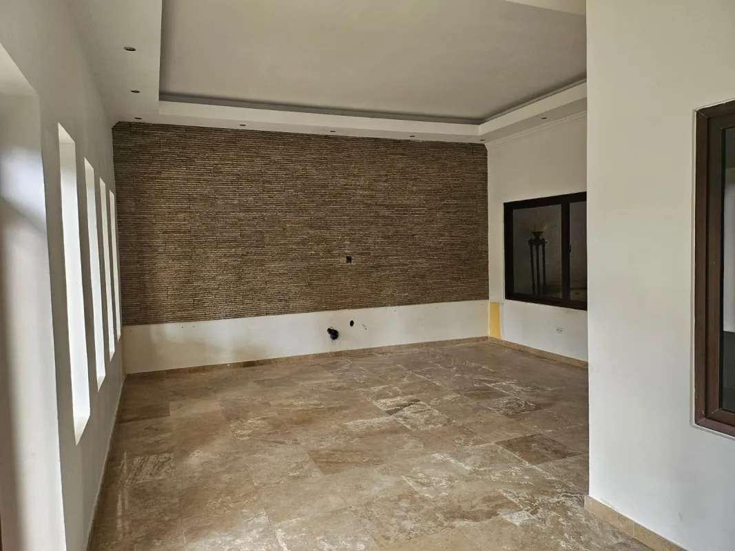 Spacious living room with modern finishes bank owned house Costa Sur Panama