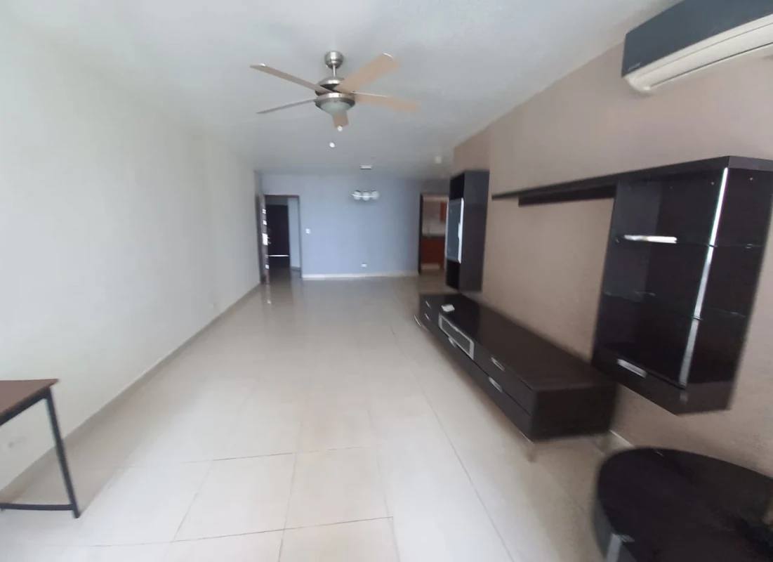 Spacious living room with ceiling fan AC cabinetry tile flooring San Francisco Bay Panama