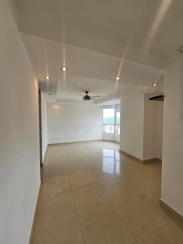 Living room with porcelain floors, ceiling fan, large window at PH Dos Mares View
