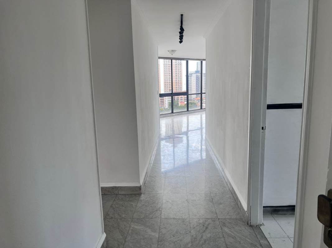 Open plan living dining area with marble tile and city skyline view PH Vista Tower Campo Alegre Panama