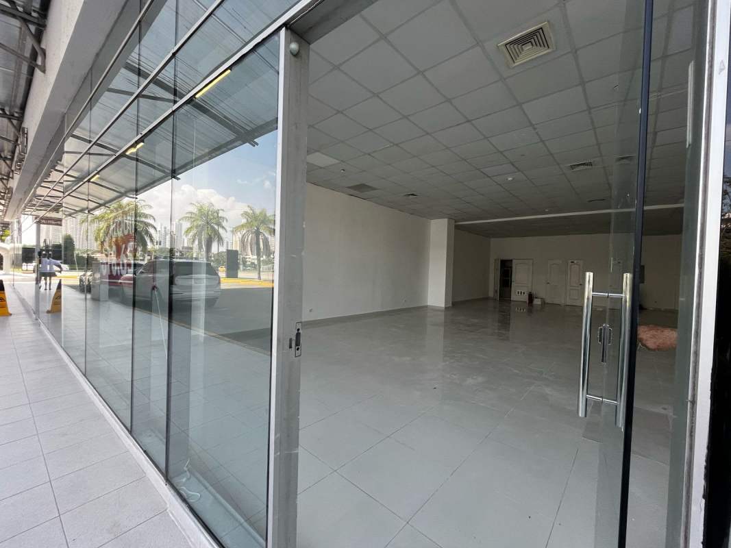 Bright empty commercial retail space with tiled flooring and glass storefront Pacific Salud Panama