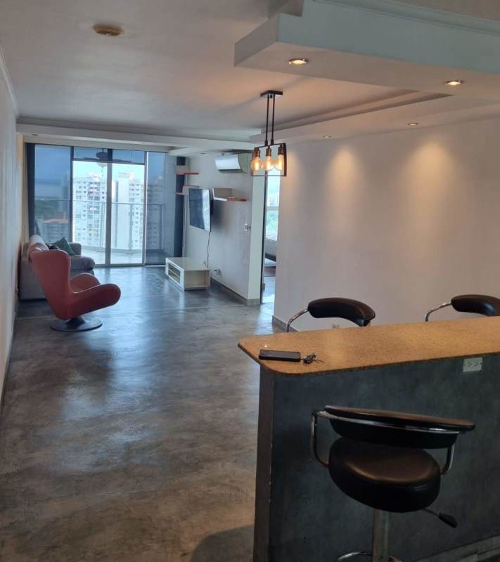 Furnished kitchen with granite counters and hexagon tile backsplash in PH Hato Pintado Plaza Panama City