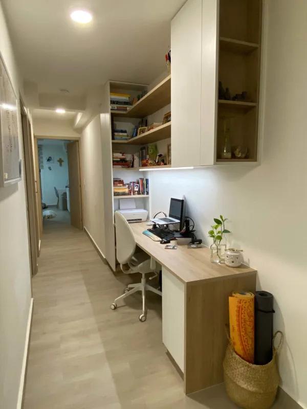 Modern kitchen with appliances and wood cabinetry in PH Bay View Bella Vista Panama