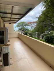 Minimalist bedroom space with window natural light ceramic floor in PH Ocean Front Gorgona Panama