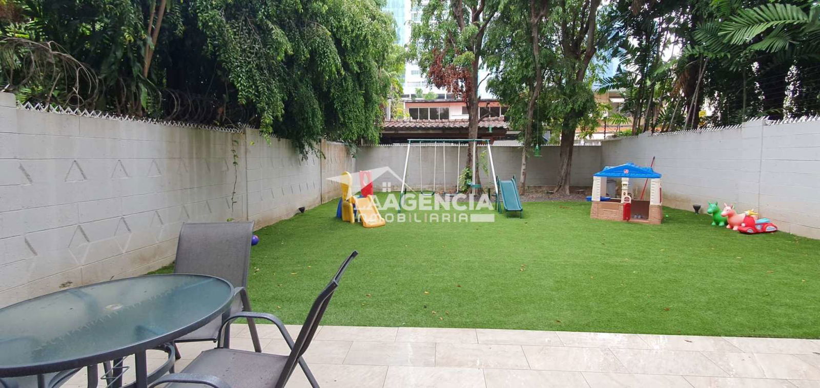 Entertainment bar with wine fridge, granite counters in remodeled Paitilla luxury house Panama