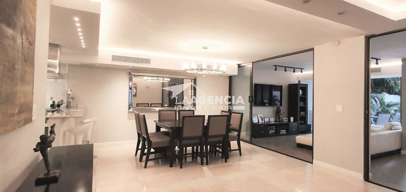 Large modern master suite with private balcony overlooking Pacific Ocean in Paitilla home Panama