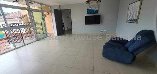 Resort-style swimming pool and clubhouse at PH Natura Costa Verde Panama