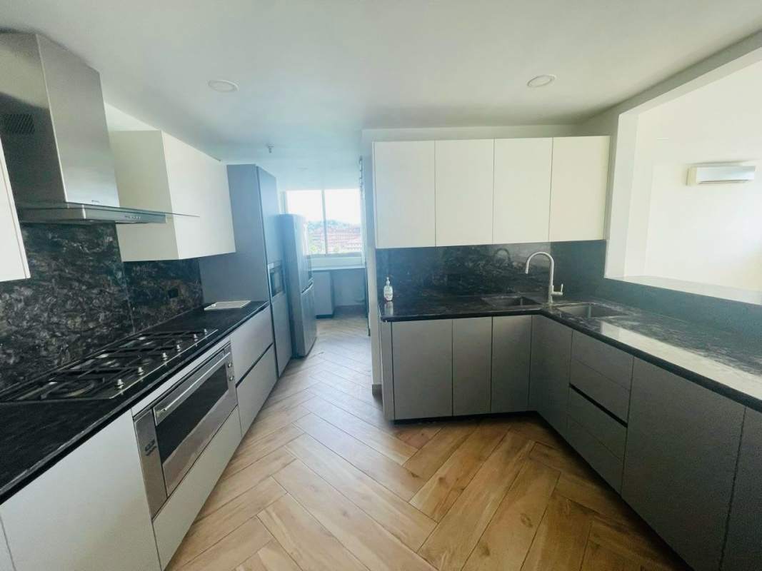 Bathroom modern fixtures walk-in shower beige tile Clayton Park apartment