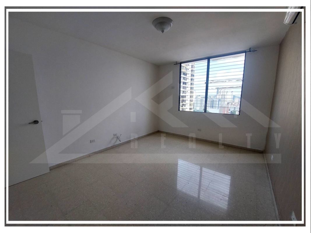 Spacious walk-in closet with built-in shelving at PH Park Loft Obarrio Panama City