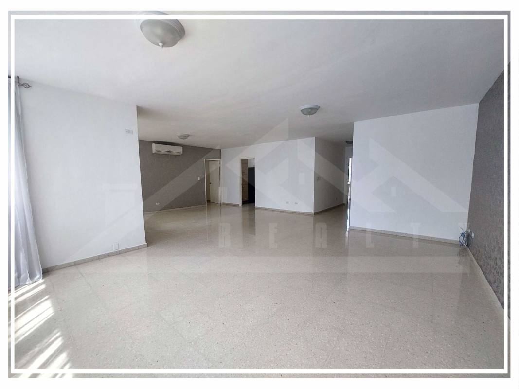 Kitchen with granite countertops and ample cabinetry in PH Park Loft Obarrio Panama
