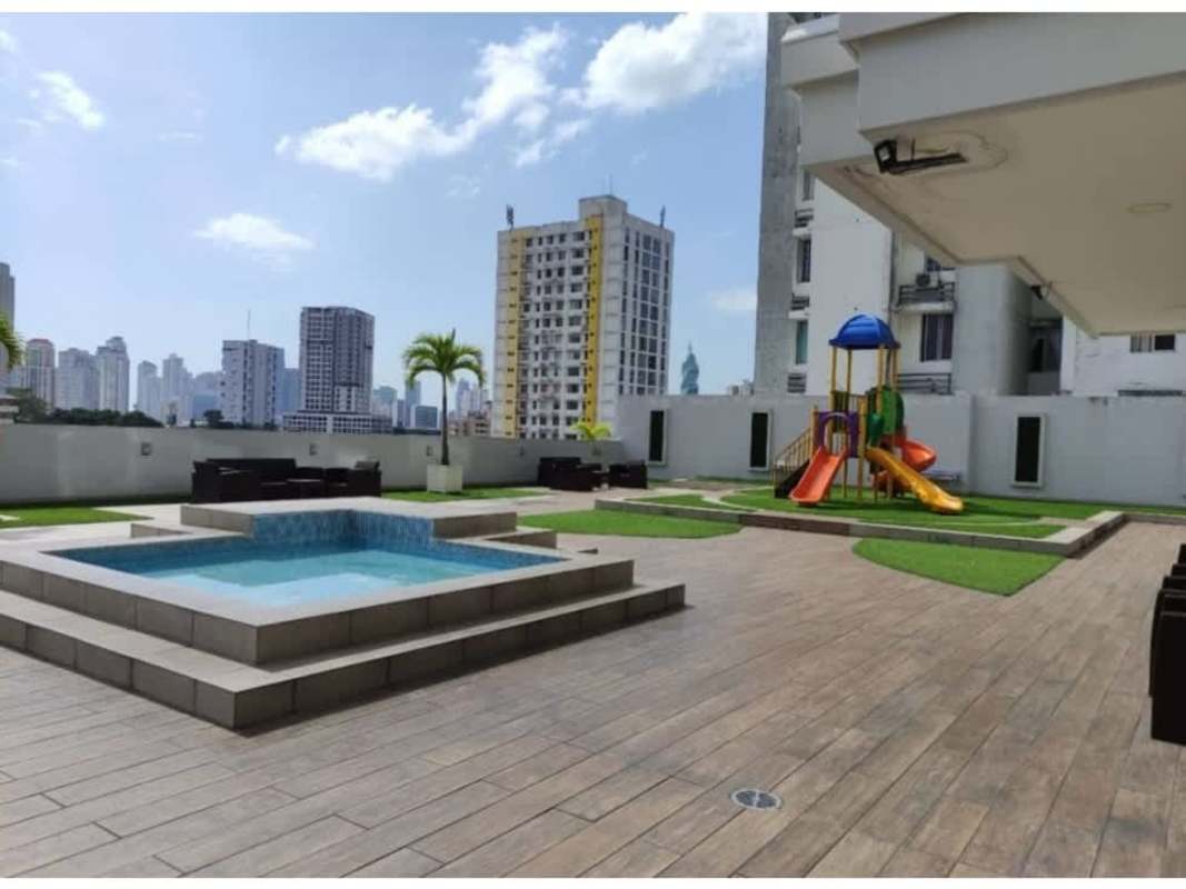 Fitness center with bikes, weights and mirror wall at PH Torres de Castilla