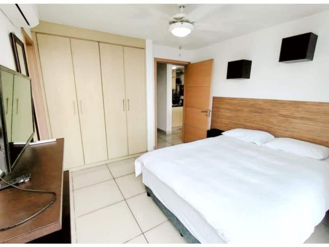 High-rise residential tower with balconies and pool PH Torres de Castilla