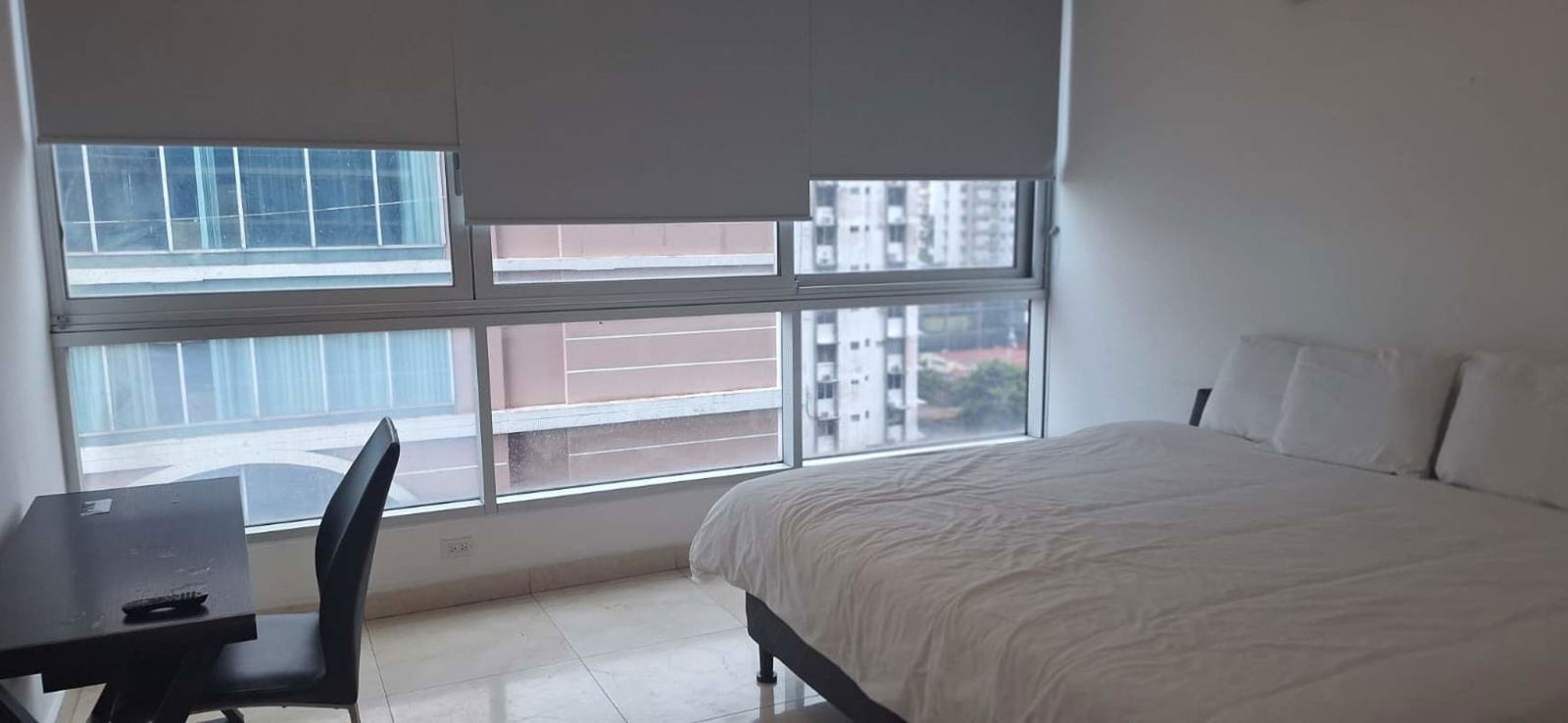 Second bedroom with city view window at PH Villa del Mar Panama City