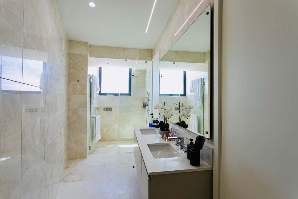 Covered terrace with outdoor seating, marina and city views at Casa del Mar Ocean Reef Panama