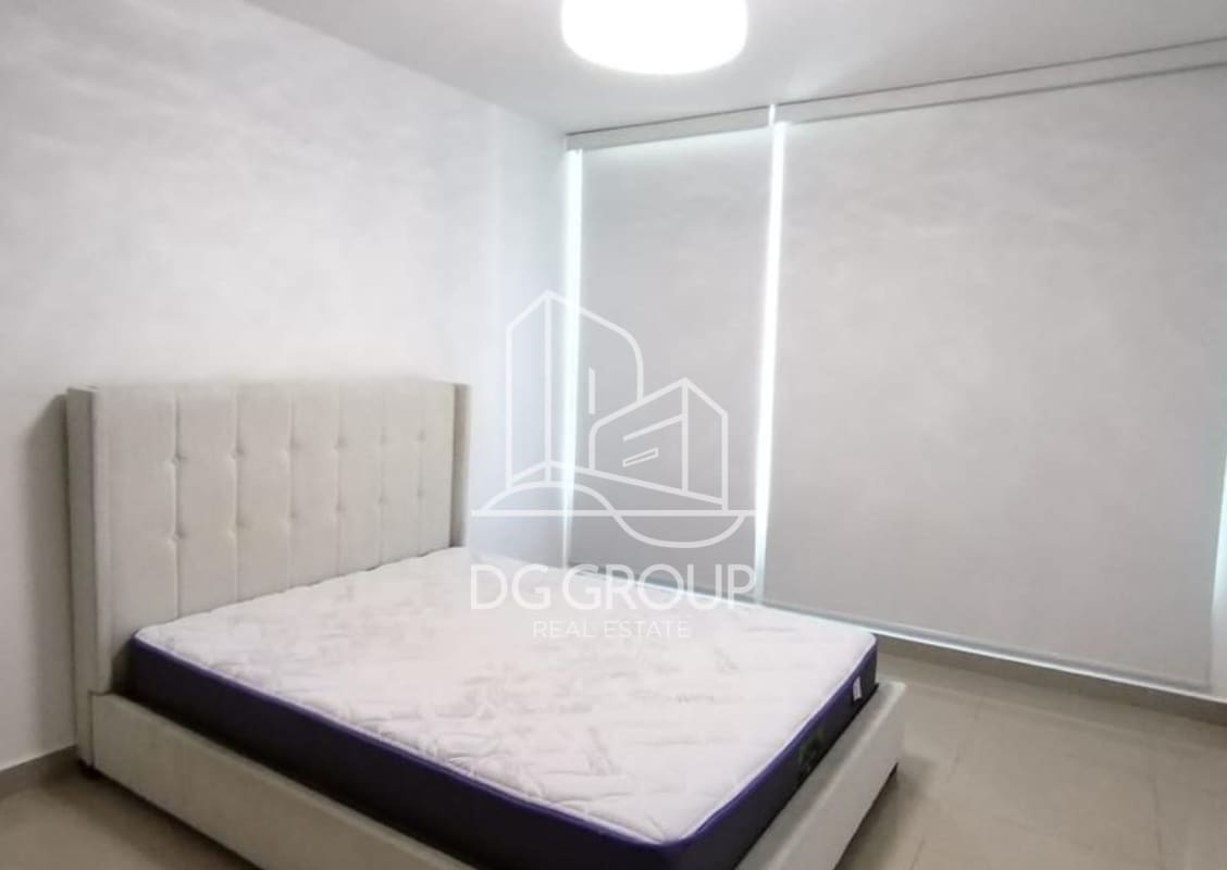 Master bedroom suite featuring walk-in closet and large windows at PH Matisse Costa del Este Panama