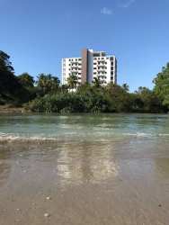 Contemporary multi-story apartment building with balconies facing Pacific Ocean in Nueva Gorgona Panama