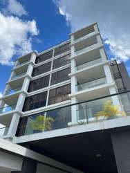 Beachfront patio area with glass sliding doors of apartment in Nueva Gorgona Panama