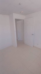 Minimalist bathroom with walk-in shower, sink, toilet La Valdeza Panama