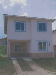 Two-story duplex house with driveway and covered porch La Valdeza Panama Oeste