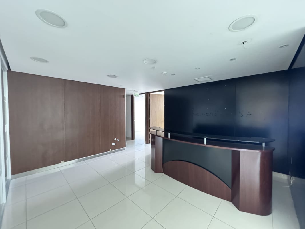 Black and white cabinetry kitchenette in commercial building Costa del Este Panama City