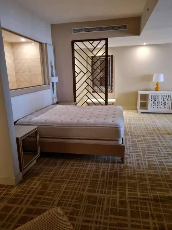 Elegant contemporary bathroom with vessel sink and modern tile Waldorf Astoria Panama Apartment