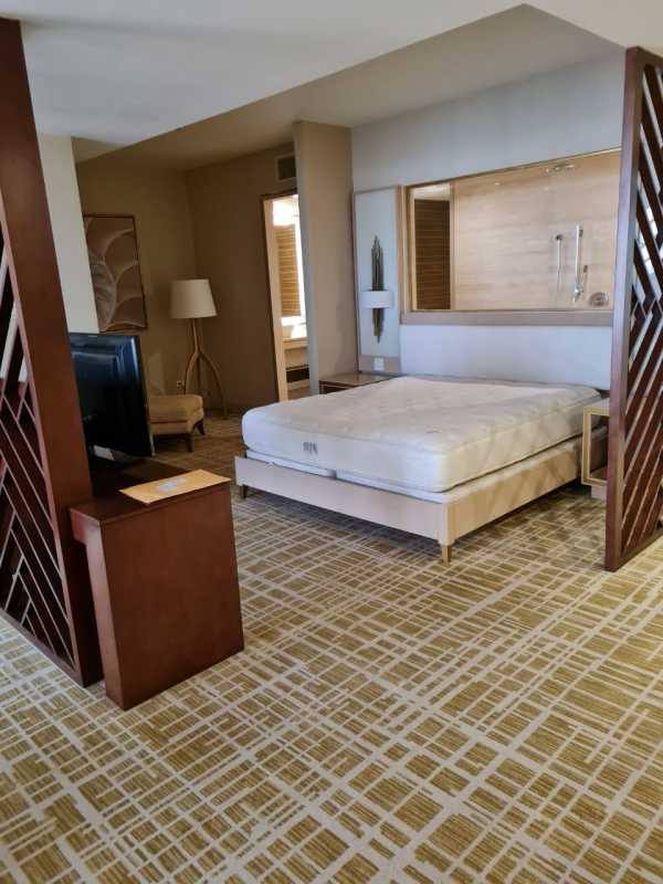 Spa-style glass enclosed large shower marble walls apartment Waldorf Astoria Panama