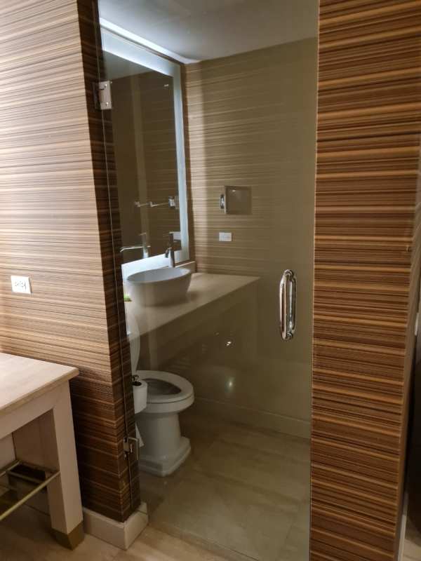 Glass enclosed walk-in shower with modern fixtures Waldorf Astoria Luxury Panama