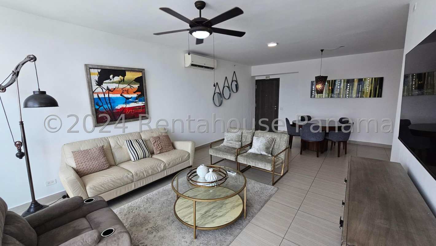 Modern kitchen with granite countertops and stainless appliances in Costa del Este apartment Panama