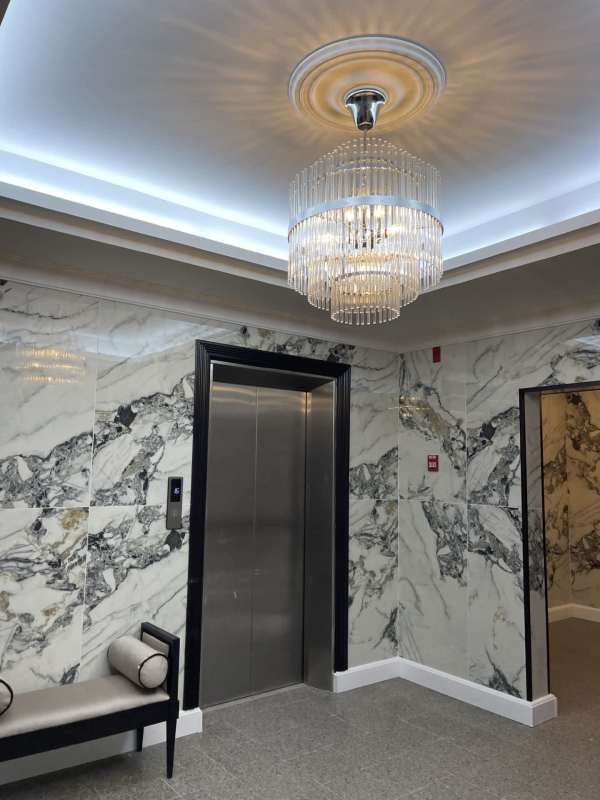 Elegant corridor entrance with chandelier at PH La Cresta Panama City