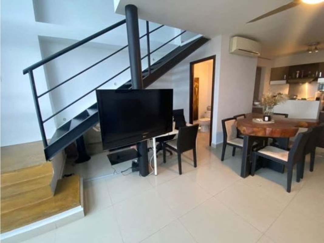 Modern bathroom with granite vanity and glass shower in PH Vitro Loft Panama