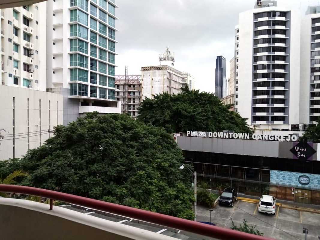 Open living area with ceiling fan, recessed lights, art, neutral tones in PH Plaza Downtown in El Cangrejo Panama City