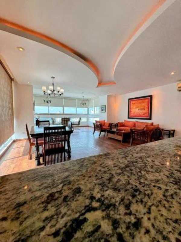 Open dining area connected to kitchen with granite countertops PH San Francisco Luxury Tower Panama