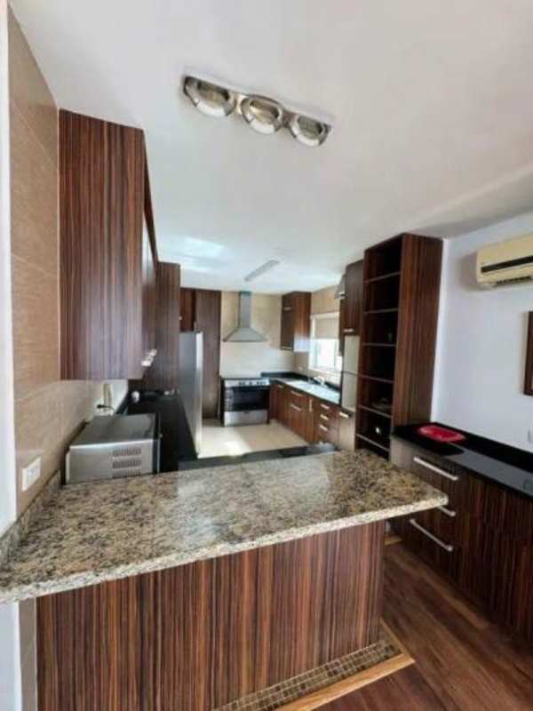 Family lounge area with wood flooring and furnishings at PH San Francisco Luxury Panama rental