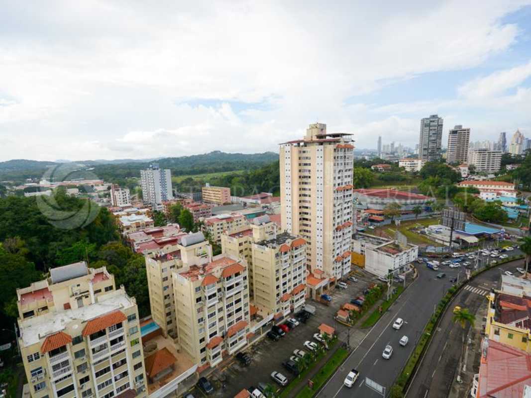 Aerial cityscape of Bella Vista showing residential towers, green spaces and roads in Panama City