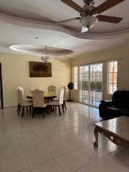 Bright bedroom with tile floors, closet, air conditioning in gated community Colón Panama
