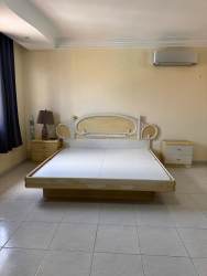 Bright secondary bedroom with large window, AC and tile floor at Costa Verde community Colón