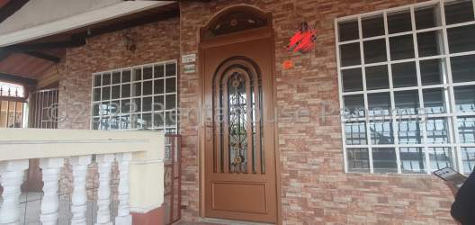 Large living room with wood ceiling beams, tile floor La Chorrera Panama