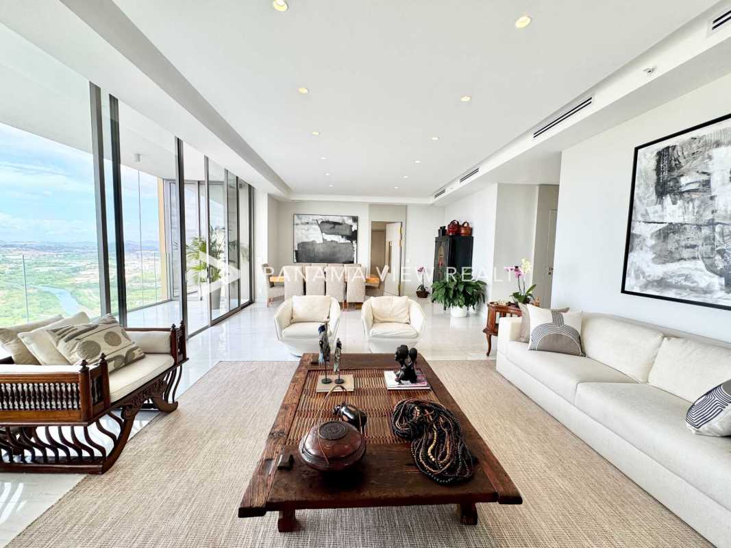 Spacious living room with floor-to-ceiling windows panoramic golf and city views La Maison by Fendi Santa Maria