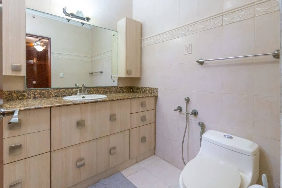 Rustic home bar with wooden cabinetry in luxury family house Urbanización La Loma Panama City